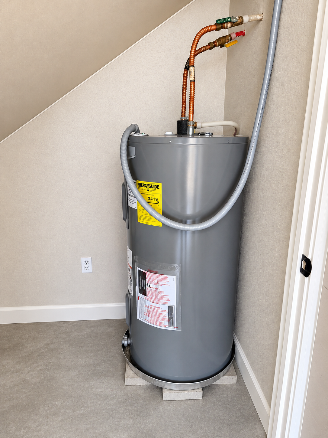 Electric tank water heater installation by RoMonica Home Services